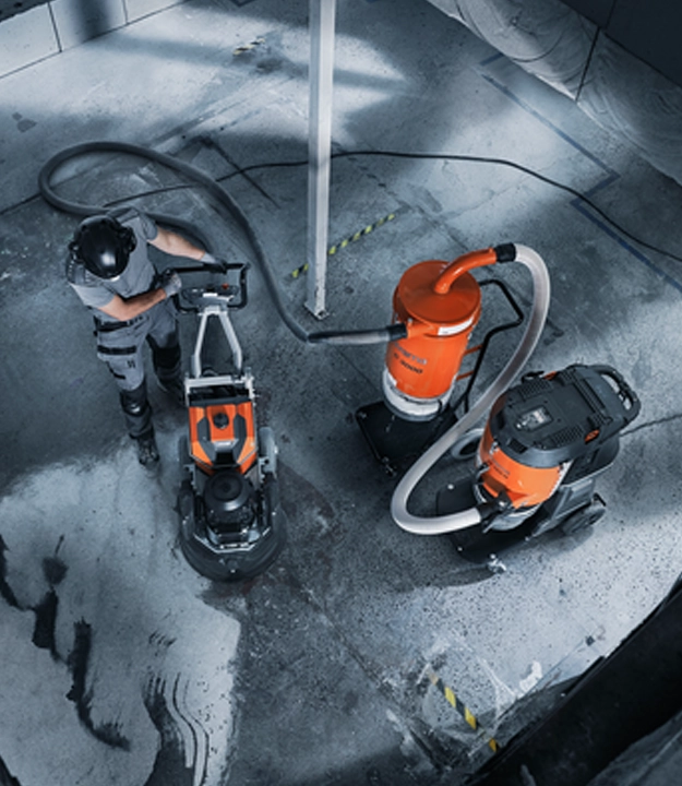 Concrete surface preparation with grinder, dust extractor and industrial pre-separator